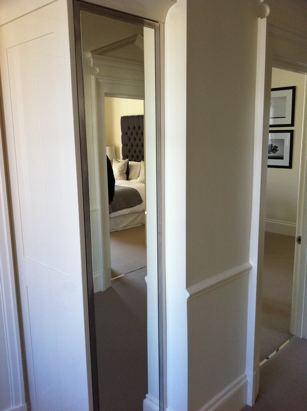 Full-length wardrobe mirror fitted in Lambeth home