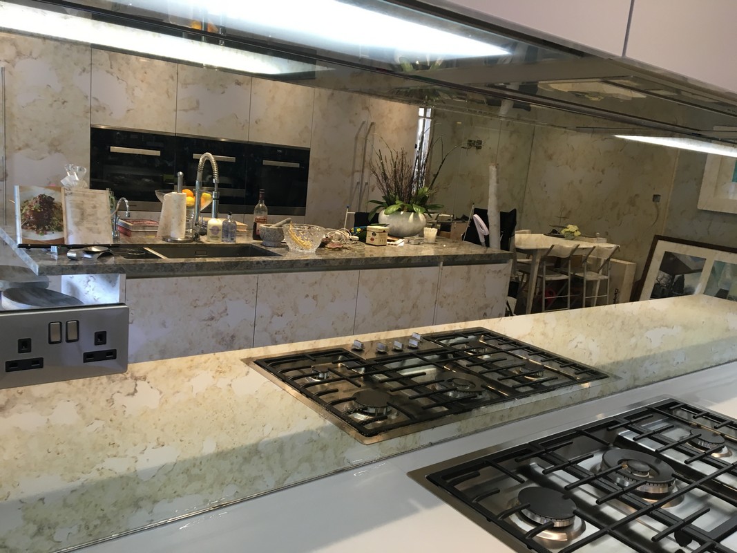 Mirror glass splashback in Lambeth luxury kitchen