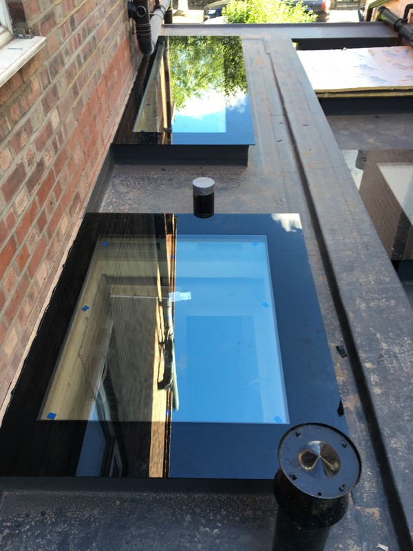 Multiple flat roof skylights on extension in Lambeth